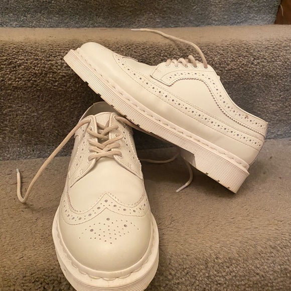 white wingtip shoes